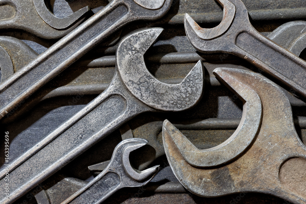 Backgrounds and textures: assortment of old wrenches, industrial abstract Backgrounds and textures: assortment of old wrenches, industrial abstract
