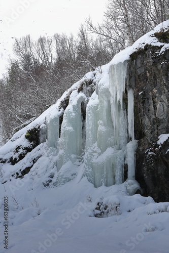 Ice waterfall beside Rv 85 road. Gullesfjordbotn-Hinnoya-Lofoten Vesteralen-Norway. 0078 photo