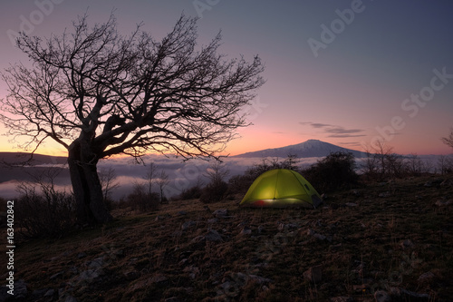 Dawning On lighting tent and Mount Etna, Sicily