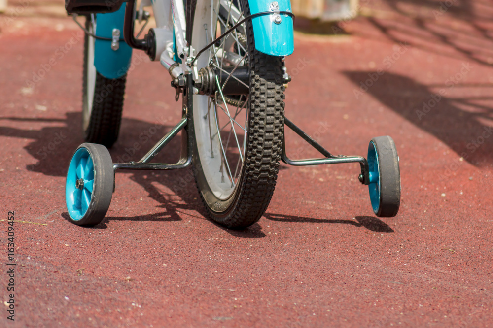 Rear wheel of children's bicycle closeup