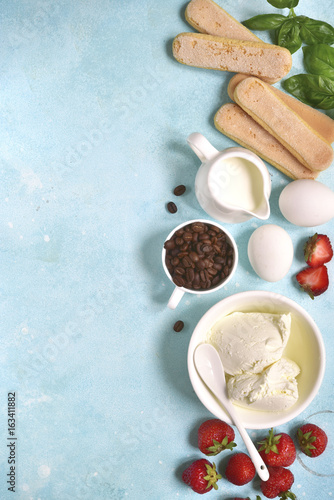 Ingredients for making traditional italian dessert strawberry basil titamisu.Top view with space for text