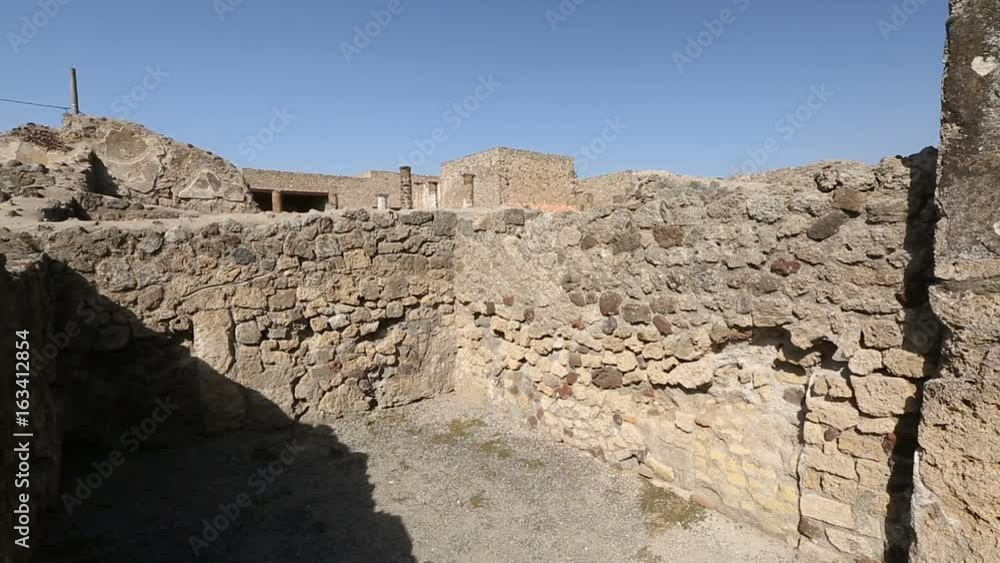 Excavated remains of buildings on territory of Pompeii town-city, sequence shot Excavated remains of buildings on territory of Pompeii town-city, sequence shot