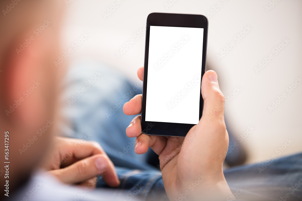 Close-up Of A Hand Holding Cell Phone Close-up Of A Hand Holding Cell Phone