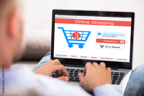 Close-up Of A Man Doing Online Shopping