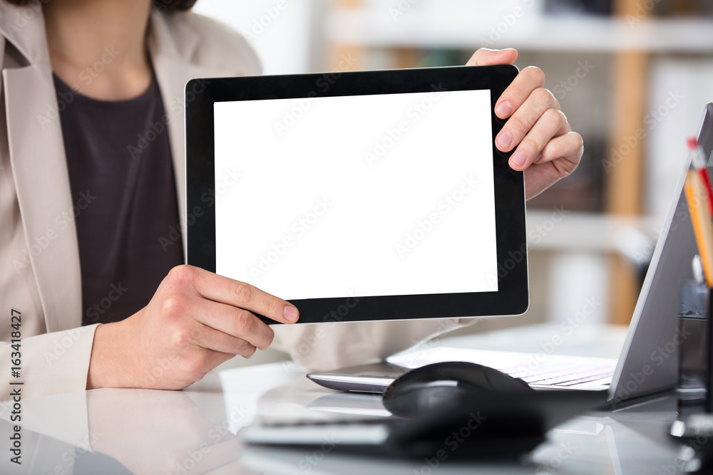 Businesswoman Showing Digital Tablet With Blank Screen Businesswoman Showing Digital Tablet With Blank Screen
