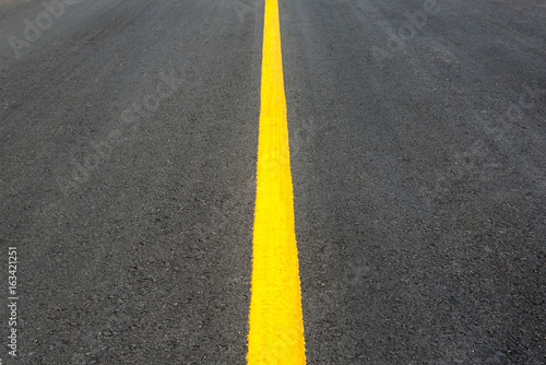yellow line on the road background.