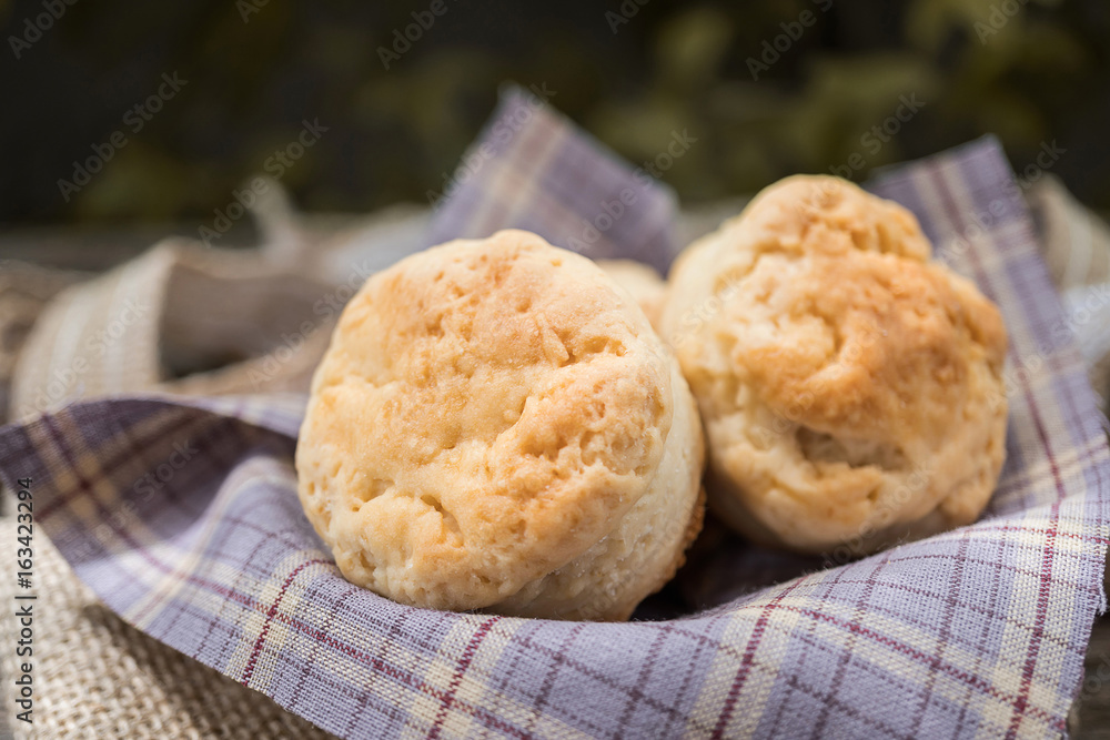 Homemade fresh classic scone on wood background Homemade fresh classic scone on wood background