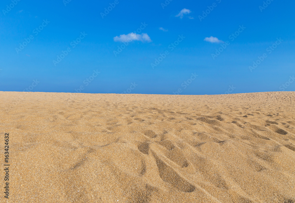Empty tropical beach with blue sky and white cloud background 