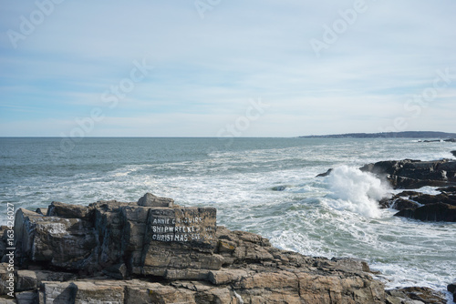 Writing on rock with waves ...