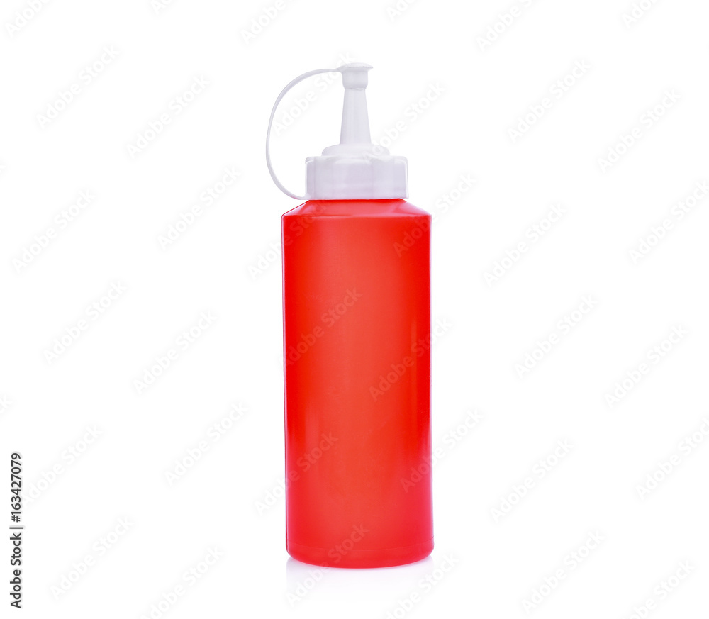 red plastic sauce bottle isolated on white background red plastic sauce bottle isolated on white background