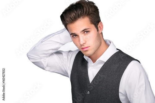 Young attractive male cute handsome teenage model  heartthrob posing in stylish fashion portrait