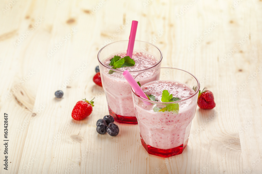 healthy berry smoothie in glass healthy berry smoothie in glass