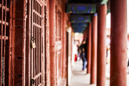Red doors and pillars at the Forbidden City in Beijing © baiterek_media