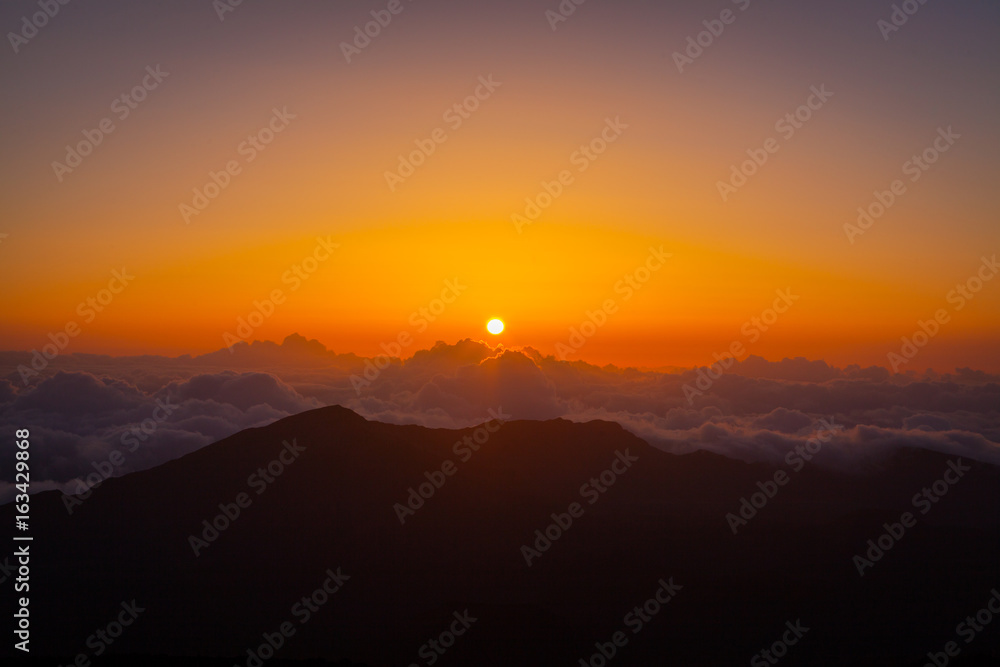 Fototapeta premium Incredible sunset over mountains. Haleakala Sunrise, Maui