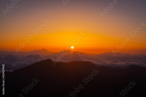 Incredible sunset over mountains. Haleakala Sunrise  Maui