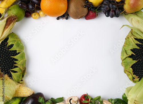 Fototapeta Naklejka Na Ścianę i Meble -  Collection of fresh fruit and vegetables on white table in form of frame - High quality studio shot. Close-up, top view, copy space.