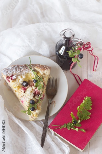 Tasty tart with wild forest fruits and blueberry fruits