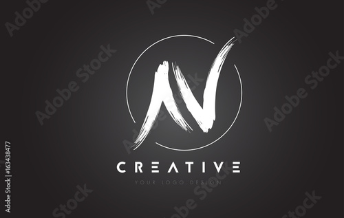 N Brush Letter Logo Design. Artistic Handwritten Letters Logo Concept. photo