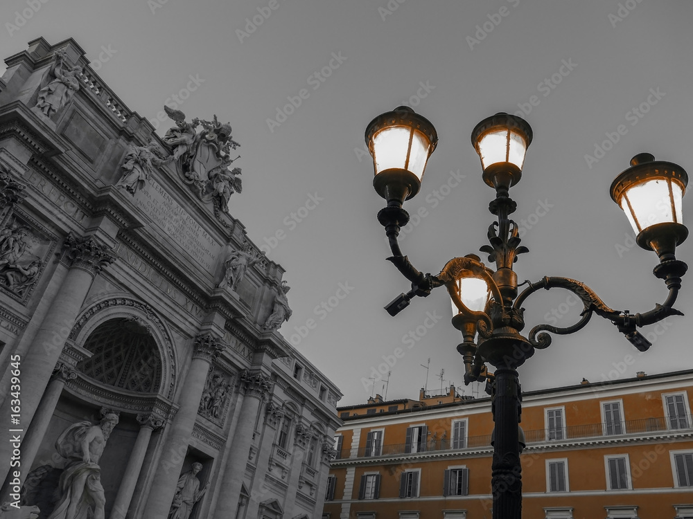 Black and color photo with Trevi Fountain in Rome, Italy