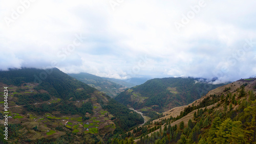 Panoramic view of the Himalayan mountains and valley via classic route to Everest Base Camp. Salleri and the Phaplu Airport, Solukhumbu district, Nepal