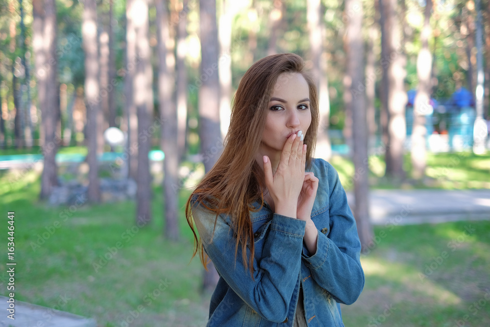Attractive beautiful woman showing air kiss Attractive beautiful woman showing air kiss