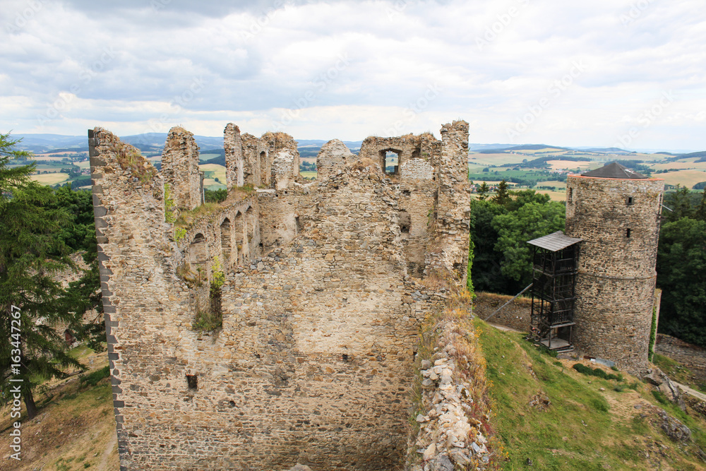 Main building of old castle ruin Helfenburk from tower. Czech landscape