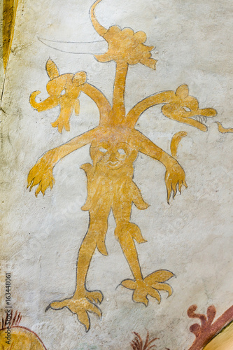 Devil with multiple heads, medieval fresco