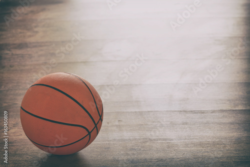 Basketball on wooden floor © Monika Wisniewska