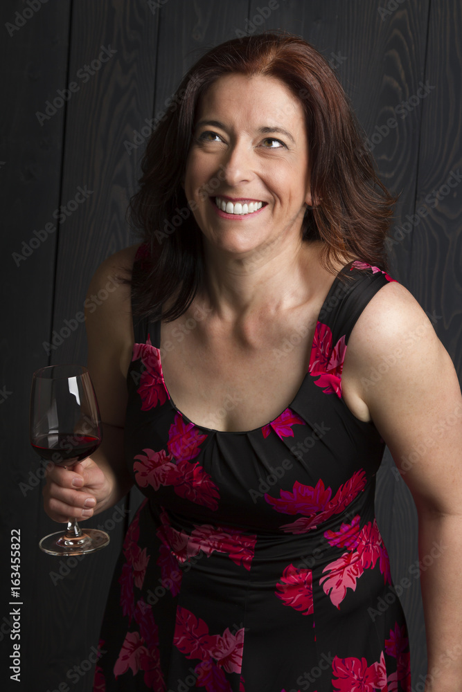 Laughing with a glass of wine Laughing with a glass of wine