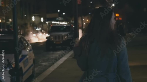 Girl passes by the police car slow motion photo