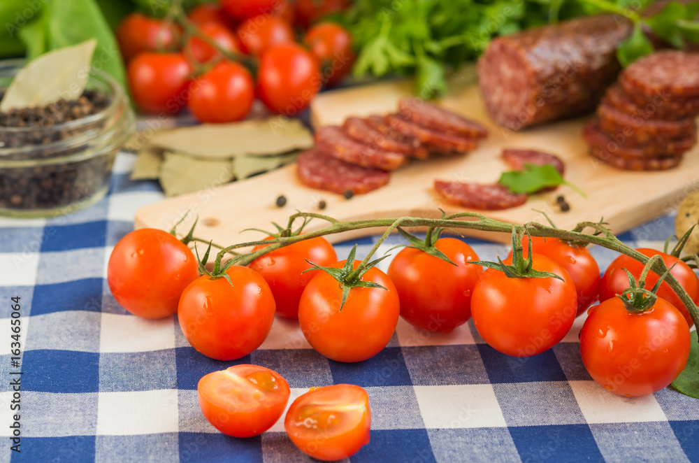 Cherry tomatoes on the kitchen table Cherry tomatoes on the kitchen table