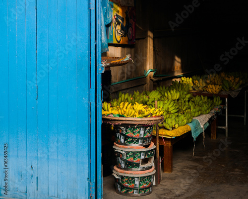 Blue door and Banana selling photo