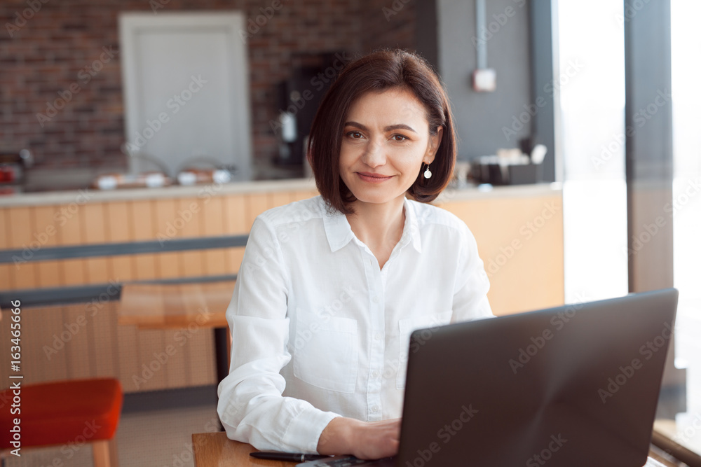 Woman working with laptop Woman working with laptop