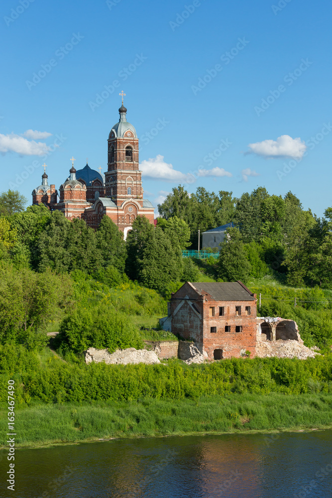 The ruins of an abandoned building and Transfiguration cathedral in Kovrov, Vladimir region, Russia
