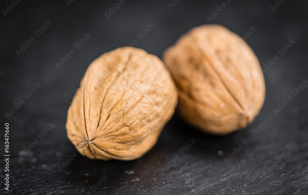 Walnuts (selective focus, close-up shot) Walnuts (selective focus, close-up shot)