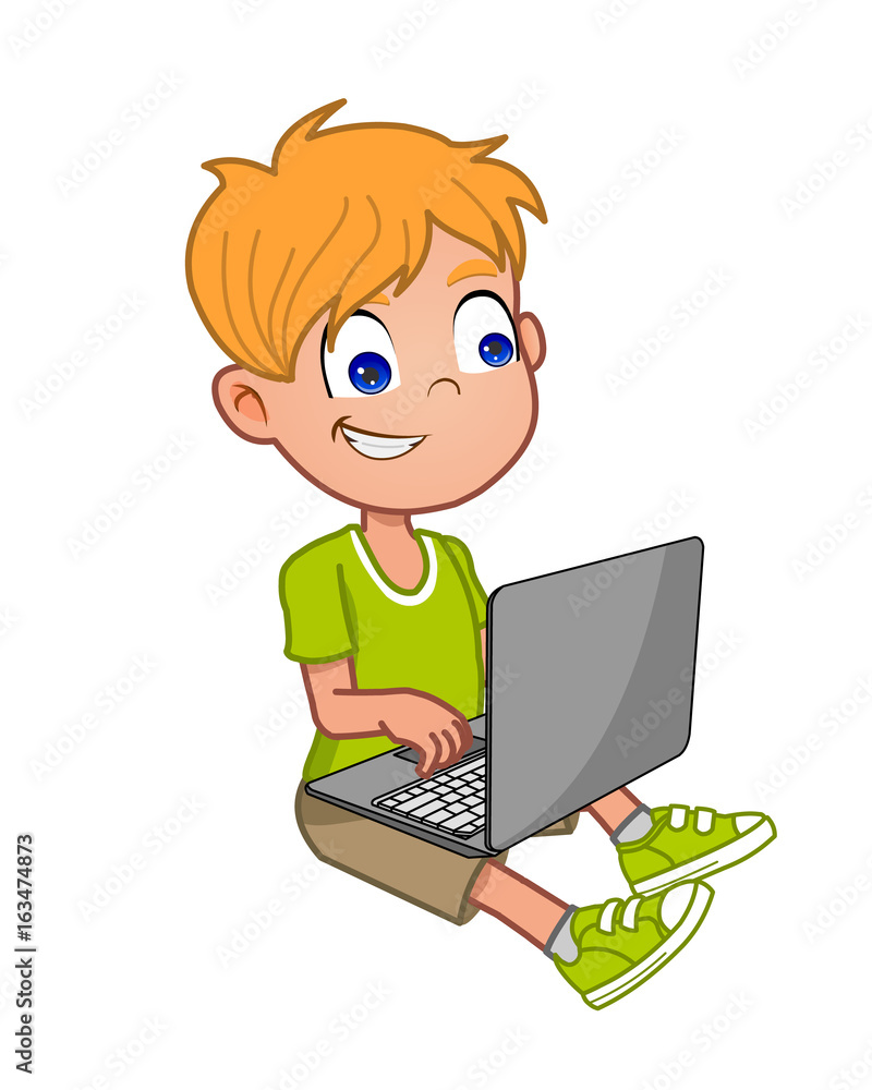 Boy using laptop computer Boy using laptop computer