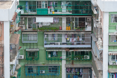 Caged apartment building showing overcowed and poor problem in Hong Kong