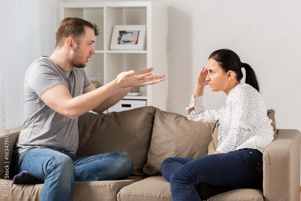 unhappy couple having argument at home unhappy couple having argument at home