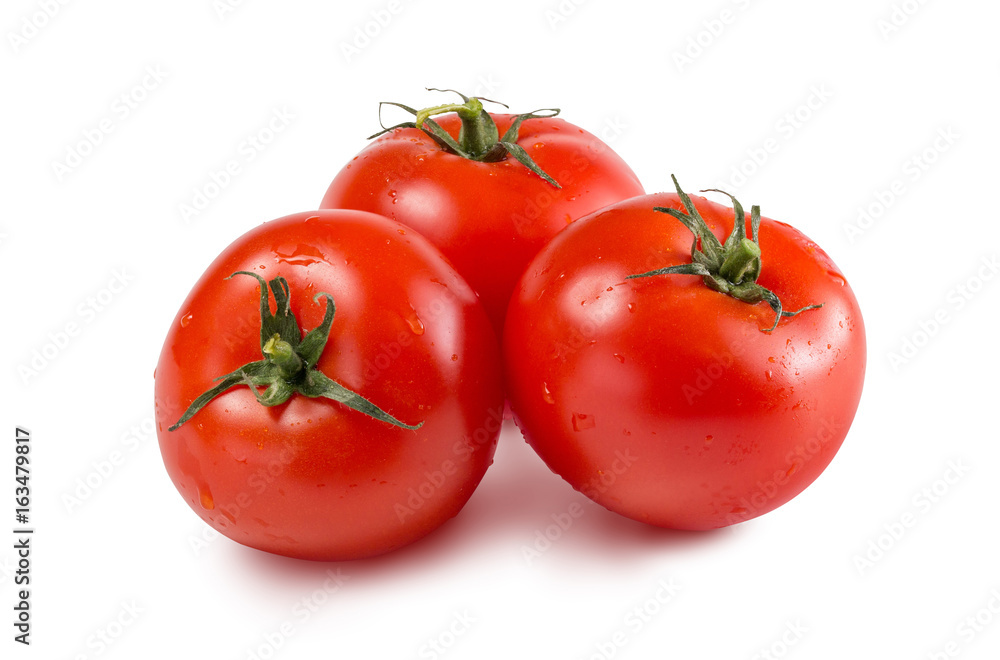 Red fresh tomatoes on a white isolated background Red fresh tomatoes on a white isolated background