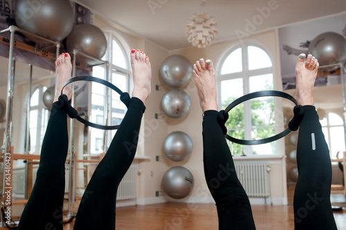 Pilates workout with Pilates ring photo