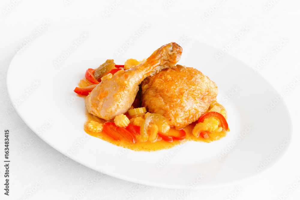 chicken leg and thigh stewed in sweet and sour sauce with vegetables and pineapple chicken leg and thigh stewed in sweet and sour sauce with vegetables and pineapple