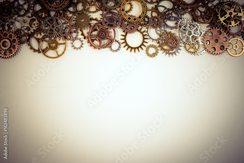 Set of rusty metal gears or cogs gear isolated on a white background. Closeup of metal cog gears texture pattern decorative frame for connection, innovation and team work concept.