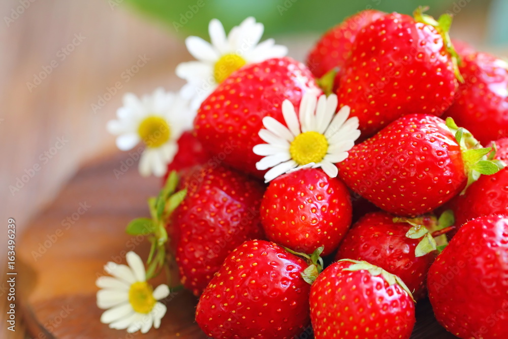 Ripe fresh strawberries on wooden table Ripe fresh strawberries on wooden table
