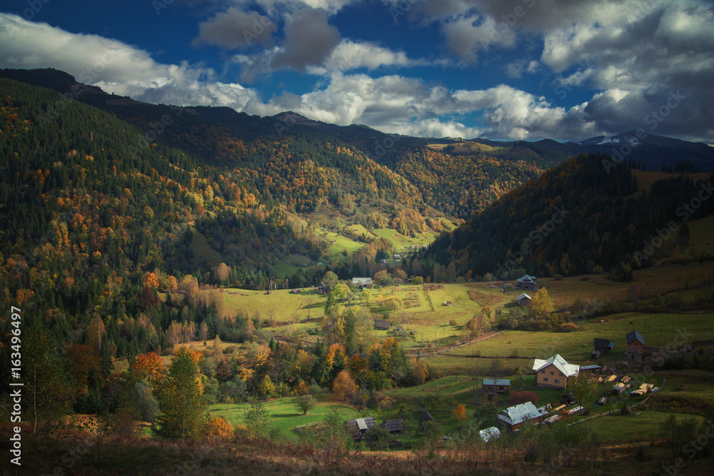Autumn  in Carpathian mountains with blue sky
