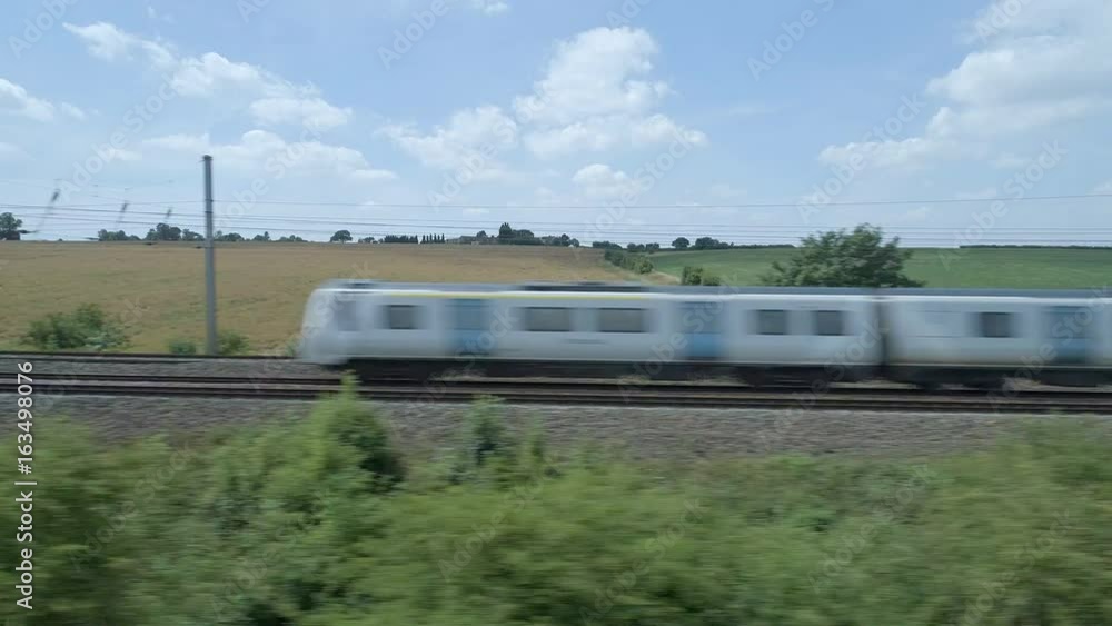 Low Level Fast Aerial View of Two Commuter Trains Low Level Fast Aerial View of Two Commuter Trains