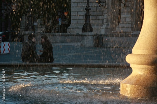 Lover behind the Fountain