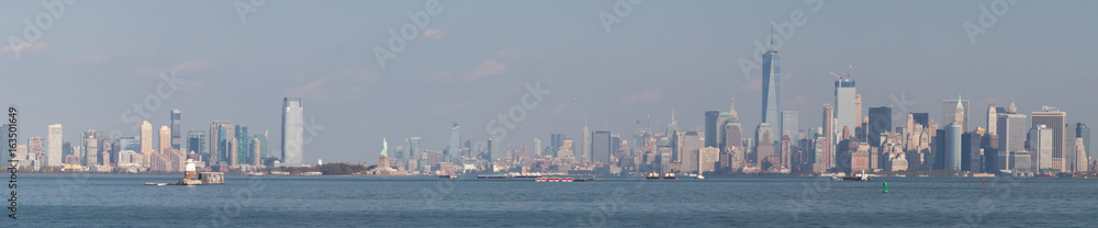 Panorama of New York Skyline with the Statue of Liberty Panorama of New York Skyline with the Statue of Liberty