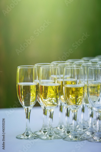 Glasses with champagne on the table