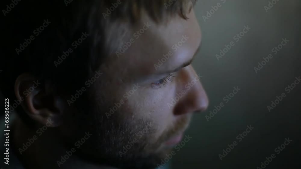 Young man play video game on PC. Guy is very focused , serious and thougghtful. Young man play video game on PC. Guy is very focused , serious and thougghtful.