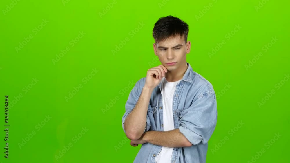 Man thinks and finds a way out of the current situation, eureka. Green screen Man thinks and finds a way out of the current situation, eureka. Green screen